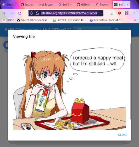 screenshot of a browser showing an image of Asuka eating a Happy Meal